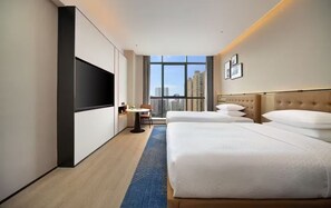 A hotel room with a large window, a bed, a TV, and a small table. - Four Points By Sheraton Chengdu, High-Tech Zone Exhibition Center (Chengdu)