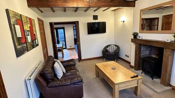 House | Living area | TV, fireplace