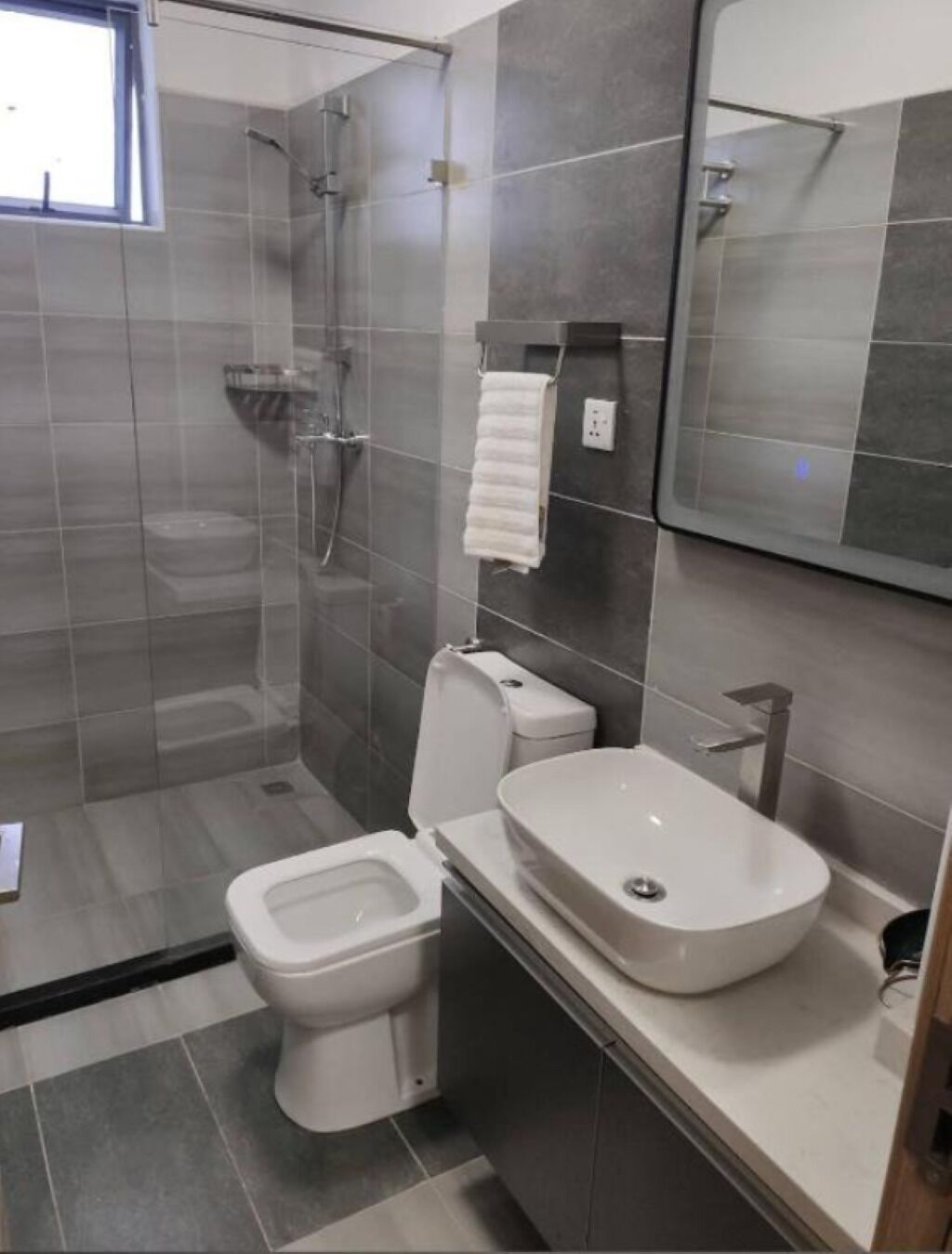 Shower, towels, soap, shampoo