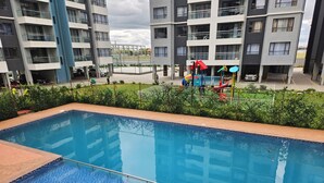 Pool - Apt 5 - 1BR Apartment with a pool, high-speed internet, close to the airport (Nairobi)