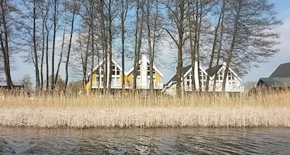 Apartment Direkt am ScharmĂŒtzelsee, Ladestation fĂŒr E-autos Privater Gastgeber