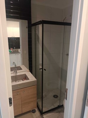 Shower, towels, soap, toilet paper