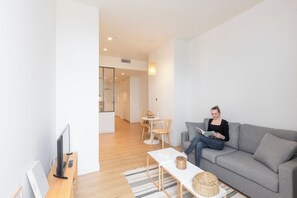 Superior-Apartment, Stadtblick | Wohnbereich