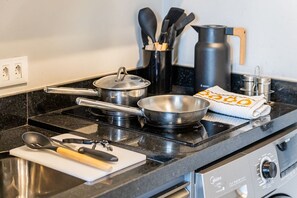 Apartment | Private kitchen | Full-sized fridge, microwave, cookware/dishes/utensils, freezer