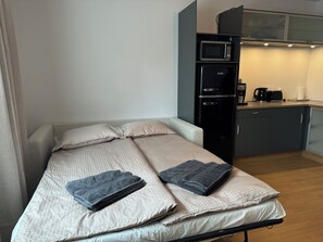 1 habitación, tabla de planchar con plancha, wifi y ropa de cama 