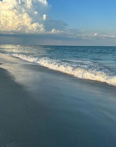 Updated 3 bedroom 2 full bath condo on True Blue's 
Golf Course with water view.