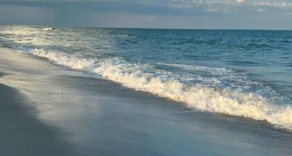 Updated 3 bedroom 2 full bath condo on True Blue's
Golf Course with water view.