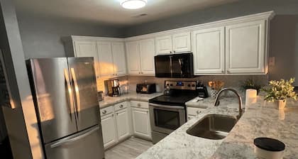 Newly renovated condo on True Blue's Signature Golf Course with water view.