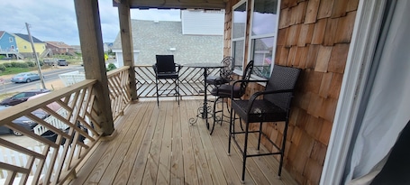 Deluxe Quadruple Room, 2 Queen Beds, Private Bathroom, Ocean View | Terrace/patio