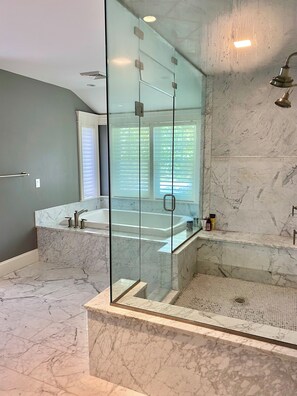 Shower, jetted tub, towels, soap