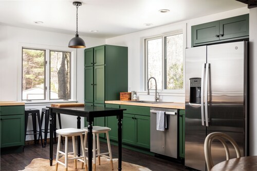 Centrally located cozy cottage tucked into the woods, a perfect family retreat