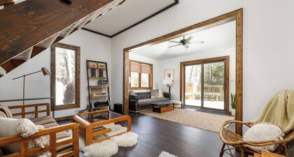Centrally located cozy cottage tucked into the woods, a perfect family retreat