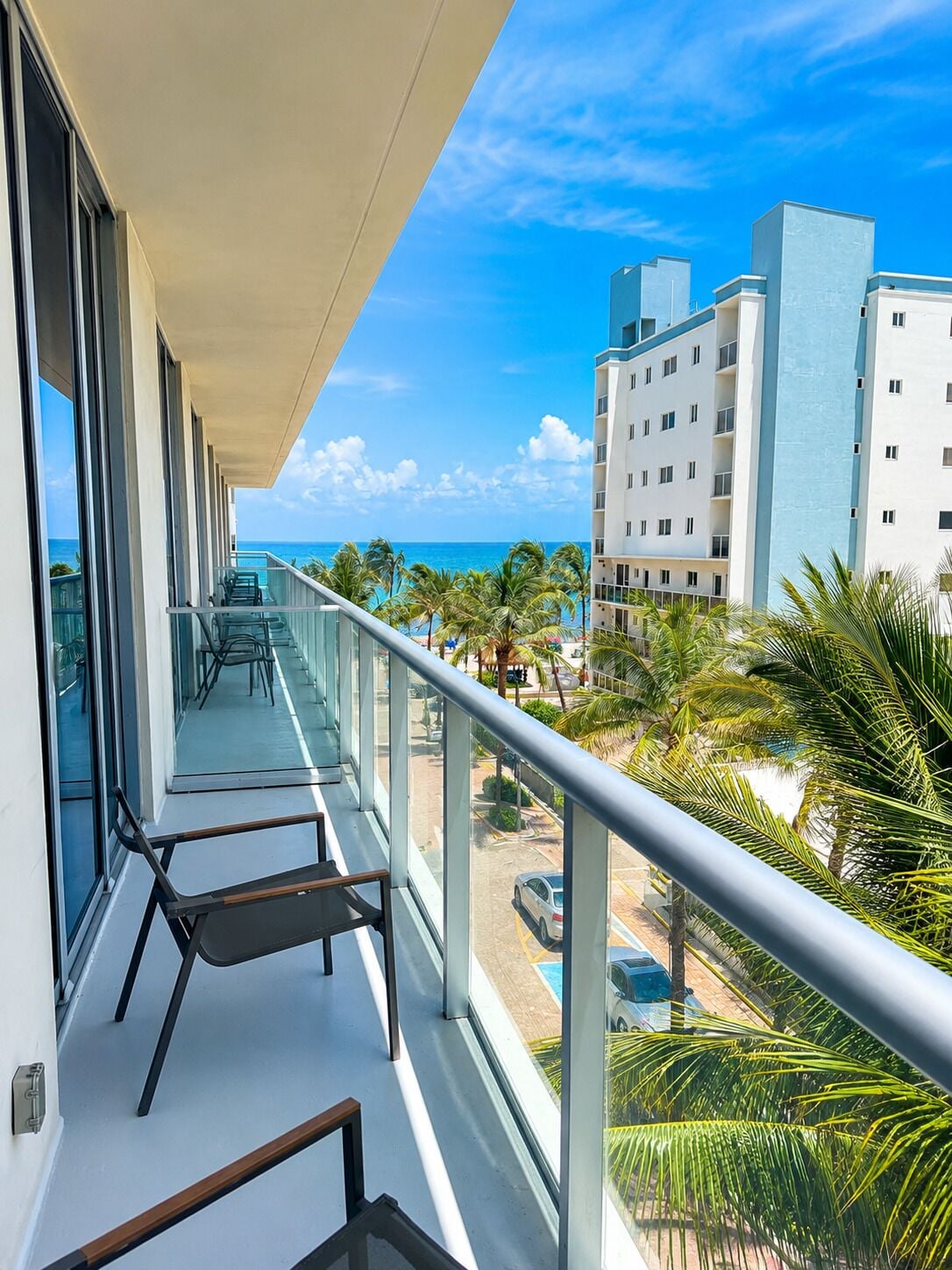 Appartement familial, Plusieurs lits, balcon, vue partielle sur l'océan | Balcon