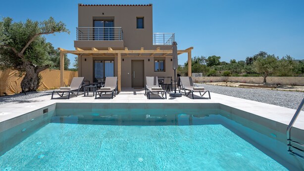 A modern two-story house with a swimming pool, outdoor seating, and a pergola. - Meli & Gio 1 villa,private pool, near tavern,Rethymno (Viran Episkopi)