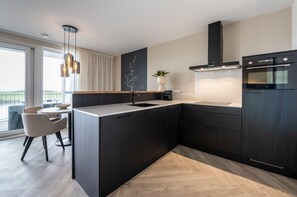 Apartment | Private kitchen | Highchair - Loft Apartment by Veerse Meer Marina (Kamperland)