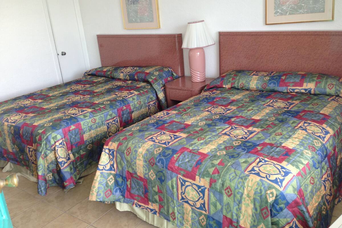Economy Double Room | Iron/ironing board, bed sheets