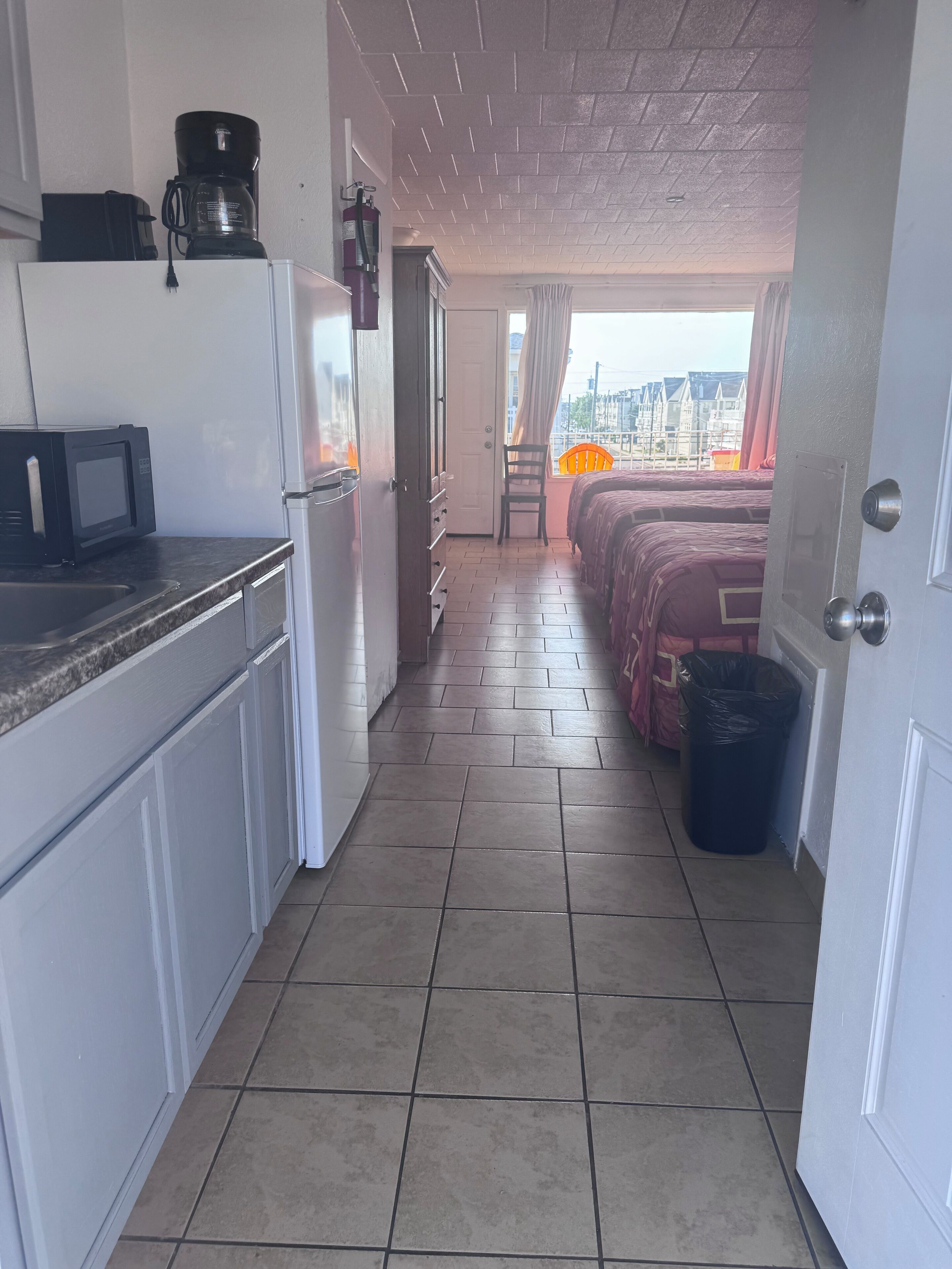 Quarto triplo elite | Cozinha privada | Micro-ondas