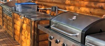 Enjoy a quiet stay on your own private deck by the lake in Room 21: Ponderosa-a Western Themed Chalet