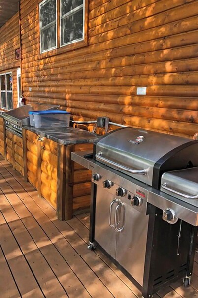 Enjoy a quiet stay on your own private deck by the lake in Room 21: Ponderosa-a Western Themed Chalet