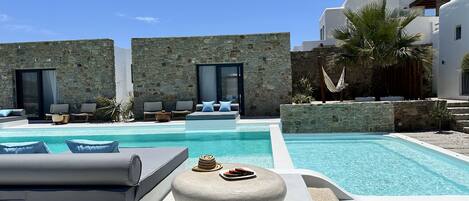 Seasonal outdoor pool, open 6:00 AM to 8:00 PM, sun loungers