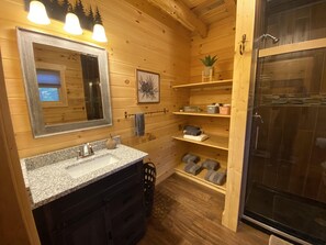Bathroom - The Overlook - The Overlook at Pine Creek Cabins and Camping in Hocking Hills, just minutes from Hocking Hills State Park. A cozy, yet spacious, pet-friendly cabin perfect for a reset surrounded by nature! Book your getaway today (South Bloomingville)