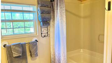 Hair dryer, towels, soap, toilet paper