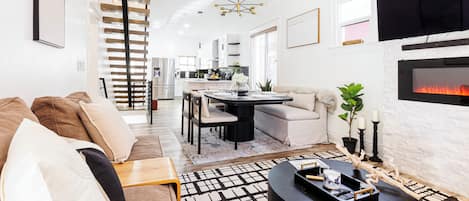 TV, fireplace, books