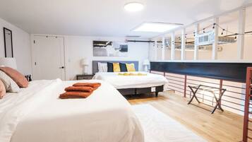 1 bedroom, desk, iron/ironing board, travel crib