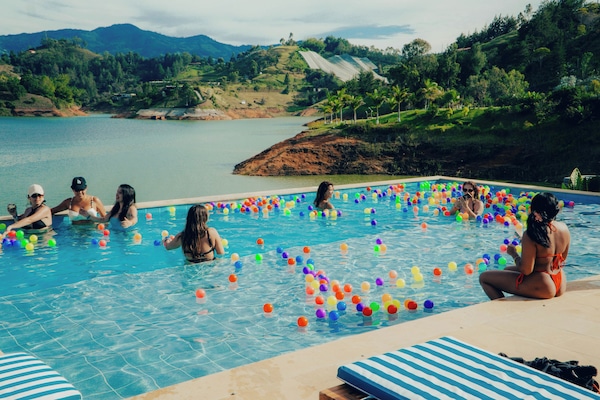 Outdoor pool, open 10:00 AM to 11:00 PM, pool umbrellas, sun loungers