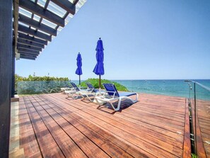 Terrace/patio - Peaceful Beachfront Condo! Direct access to the beach. Family size condo. (Sosua,)