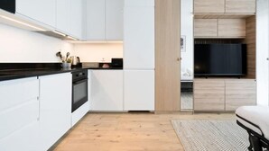 Loftsleilighet, byutsikt | Eget kjøkken