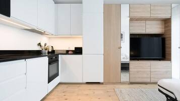 Penthouse, pemandangan kota | Dapur pribadi | Lemari es, microwave, oven, dan kompor