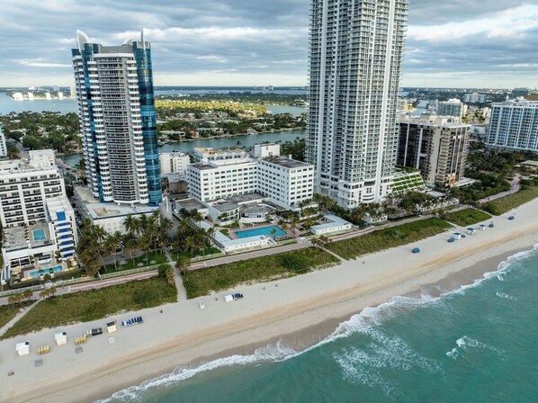 On the beach, sun-loungers, beach towels - Beach Front Beautiful New Apartment with Pool in Miami Beach. (Miami Beach)