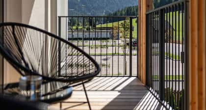 Holiday Apartment in a Hotel 'Apartment Home' with Mountain View, Shared Garden and Wi-Fi