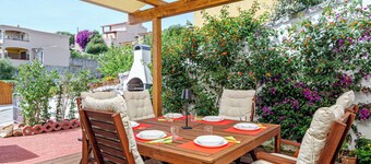 Holiday Home 'Is Arutas' with Private Terrace, Wi-Fi and Air Conditioning