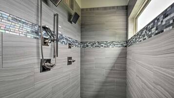 Shower, hair dryer, towels, soap