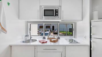 Fridge, stovetop, coffee/tea maker, toaster