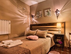 1 chambre, fer et planche à repasser, draps fournis