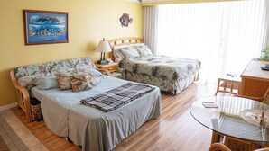 A hotel room with two beds, a ceiling fan, a dining table, and a window with curtains. - 💎LOCATION💎 5min to 🏄‍♀️🏊‍♀️🐠🦈🌸 free parking 🚙🅿️, fast WIFI💻 🌺F15A07🌺 (Honolulu)