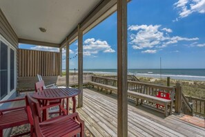 Outdoor dining - Hobbs Realty - "Second Time Around" - A bright and airy 4 bedroom oceanfront home with EV charger (Holden Beach)