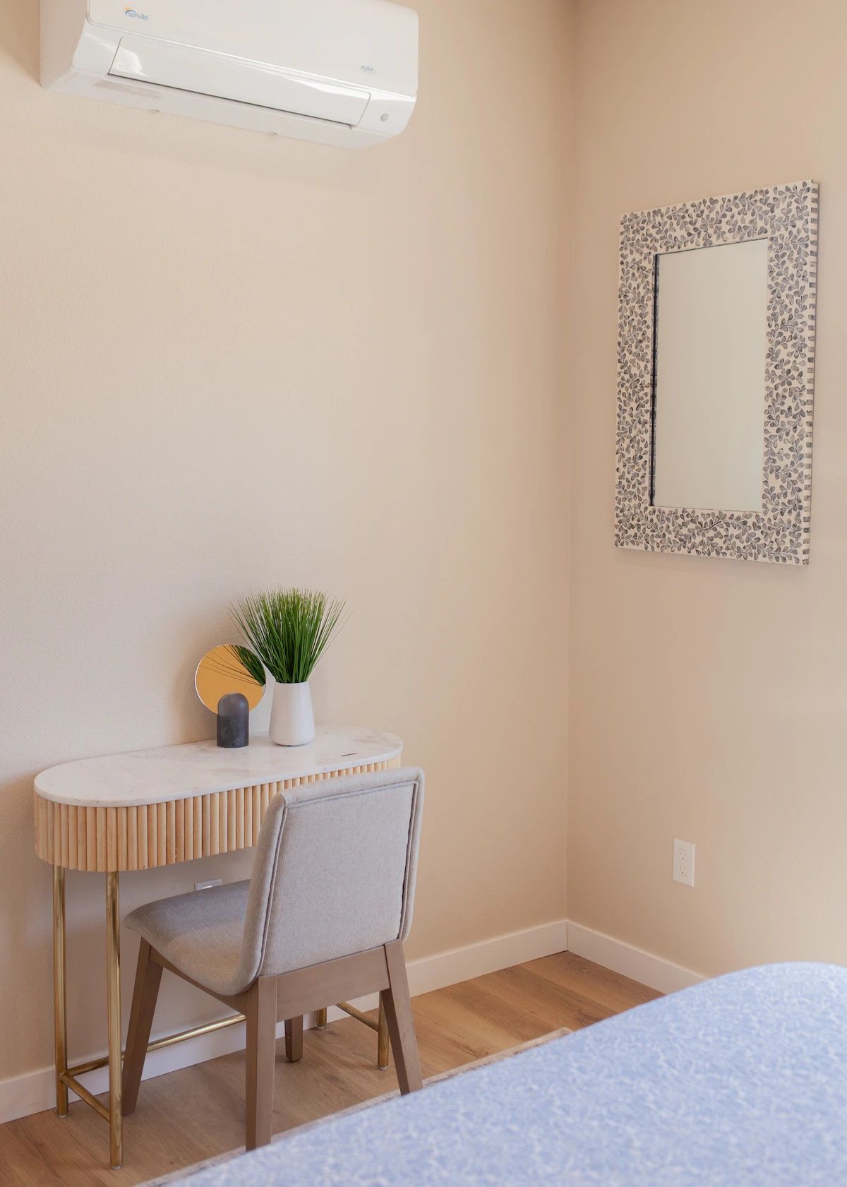 Dedicated workspace with comfortable chair and natural light.