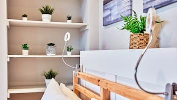 1 bedroom, desk, iron/ironing board, travel crib