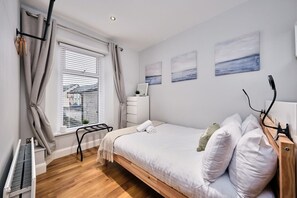 1 bedroom, desk, iron/ironing board, travel cot