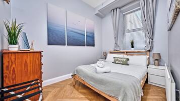 1 bedroom, desk, iron/ironing board, travel cot