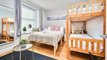 1 bedroom, desk, iron/ironing board, travel crib