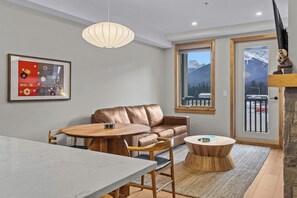 TV, fireplace - Spring Creek Vacations 1 BR Condo 211TM (Canmore)