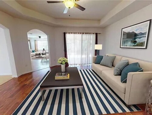 Clean, homey, spacious home in a gated community with beautiful amenities.
