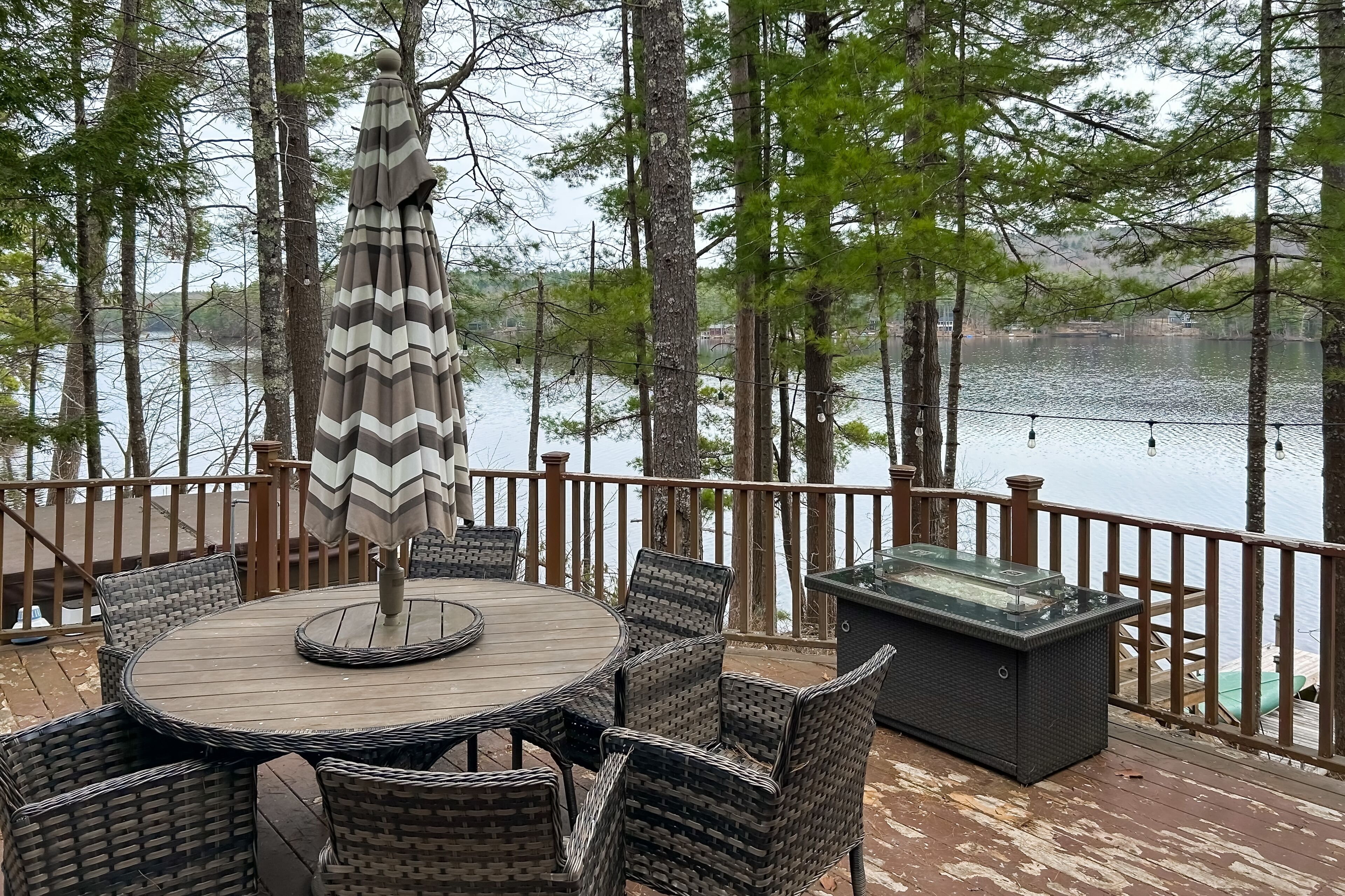 Central lakefront house with private hot tub, dock, patio bar, & beach access