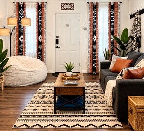 Cozy Southwestern-style living room with bold decor, plush seating, and warm touches - Firepit | off I-80 | Private Carport |1BR | Pets (Lyman)