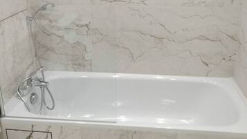 Hair dryer, towels, soap, shampoo